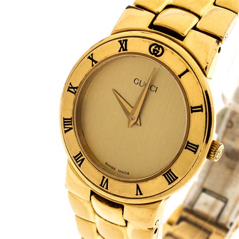 gucci watches ladies gold